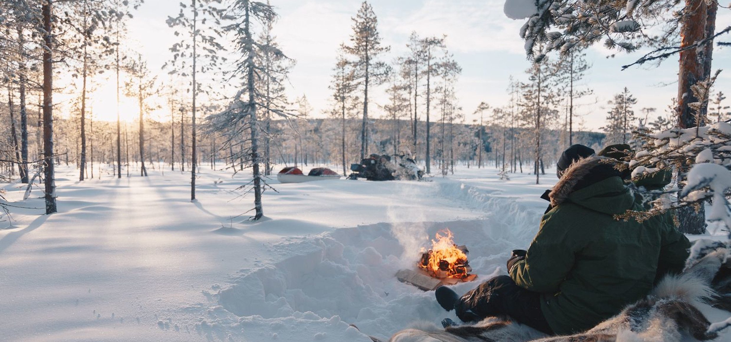 Lagerfeuer in Winterlandschaft Granö